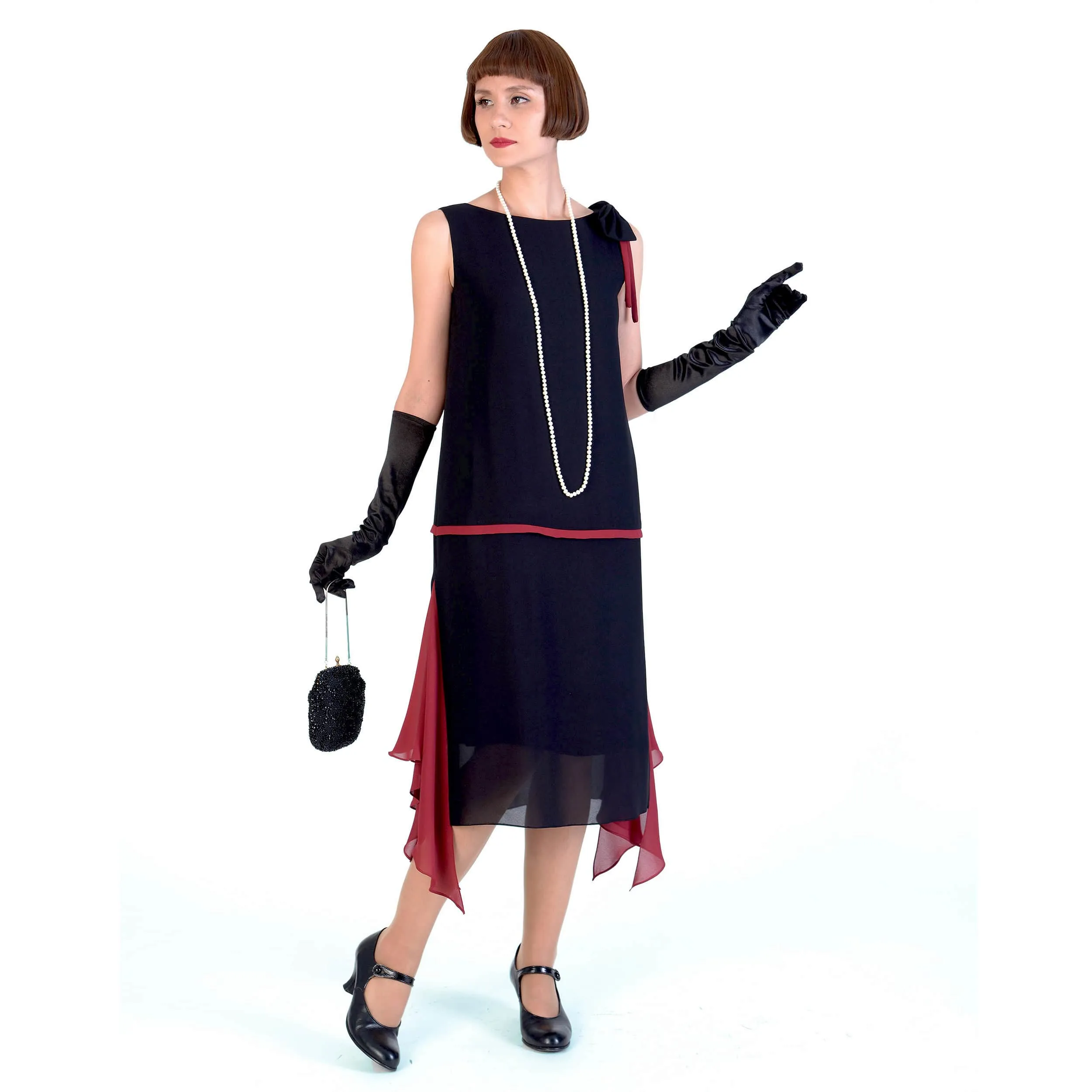 1920s black party dress with red details and shoulder bow