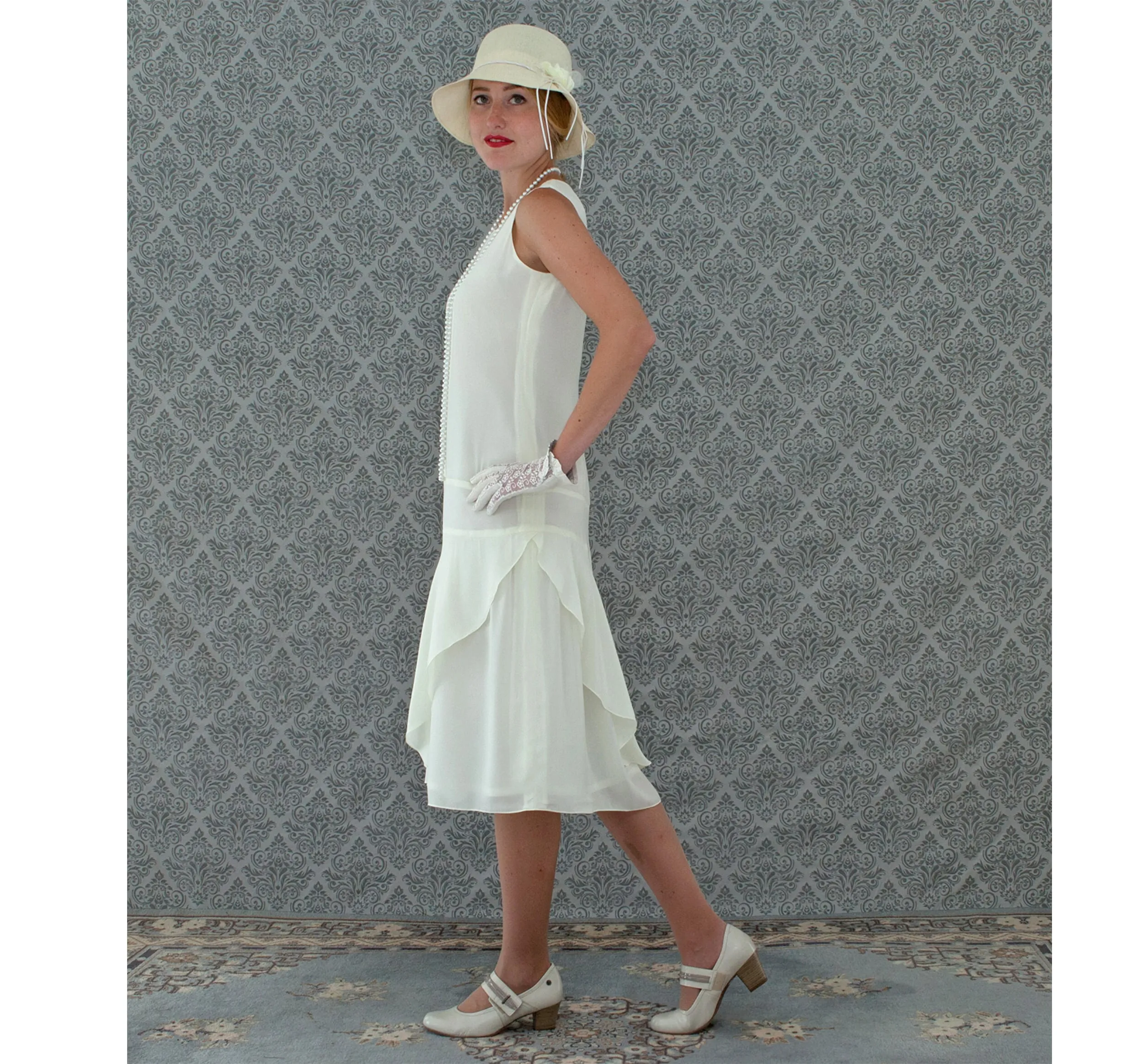 Cream chiffon flapper dress with a ruffled skirt detail