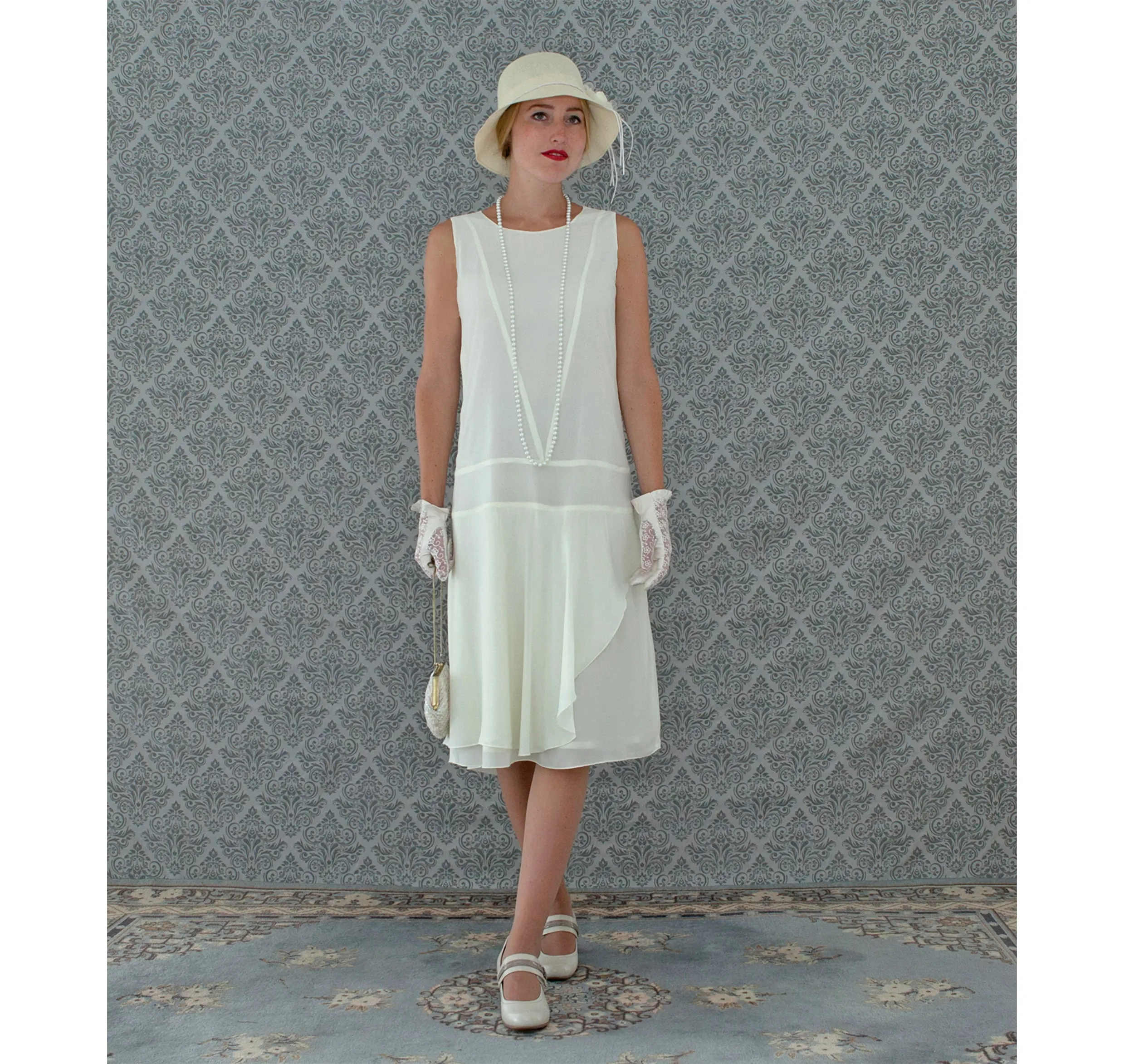 Cream chiffon flapper dress with a ruffled skirt detail